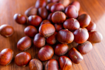 Stack of fresh raw chestnuts