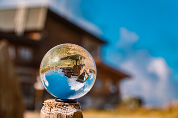 Crystal ball alpine summer landscape shot at the famous Nebelhorn summit near Oberstdorf, Bavaria,...