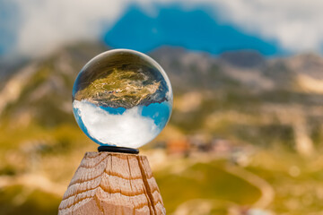 Crystal ball alpine summer landscape shot at the famous Nebelhorn summit near Oberstdorf, Bavaria,...