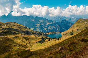 Beautiful alpine summer view with a lake at the famous Nebelhorn summit near Oberstdorf, Bavaria,...