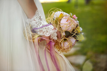 Bride holding flowers close up