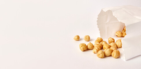 Hazelnuts fell out of the paper bag. Food packaging.