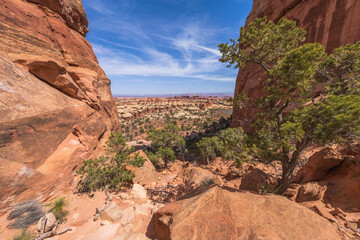 hiking the chesler park loop trail in the needles in canyonlands national park, usa