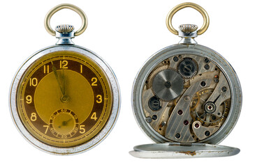 Antique watch on an isolated background. Dial and mechanism with a spring to drive the mechanism.