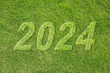 Grüner Rasen mit der Aufschrift 2024