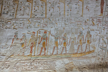 Reliefs and hieroglyphics in a tomb in the valley of Kings, Egypt