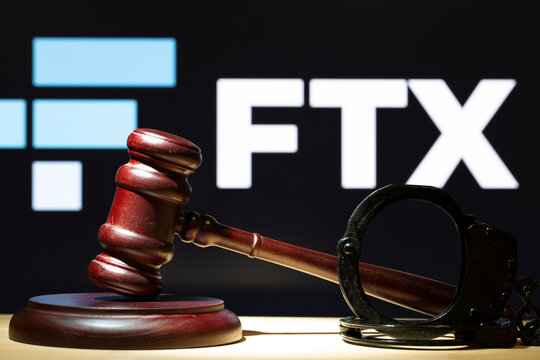 Syktyvkar, Komi, Russia, January 5, 2023, FTX . Hammer on the table on the background of the FTX logo. The concept of the trial.