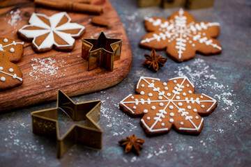 Christmas gingerbread cookies on wooden desk closeup