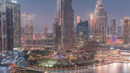 Fototapeta na wymiar Aerial view of Dubai city day to night timelapse in downtown.