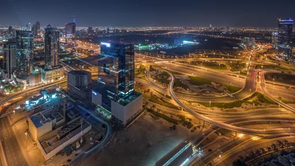 Zelfklevend Fotobehang Aerial panoramic view of media city district and highway junction all night timelapse © neiezhmakov