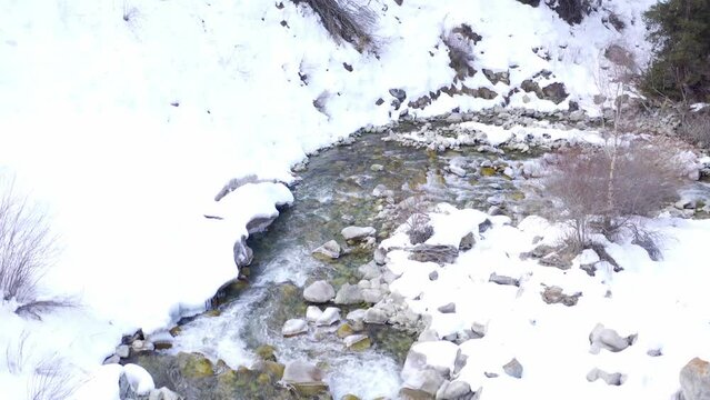 ala archa river kyrgyzstan in winter flight on a drone view from above