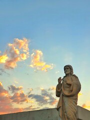 statue of  jose father of jesus at sunset