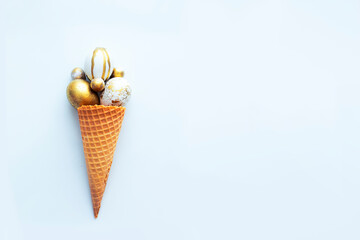 easter  holidays background with  golden eggs over white table