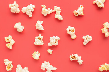 Tasty popcorn on red background