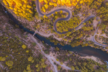Winding road and stone bridge with river from Koprulu Tazi Canyon. Manavgat Antalya Turkey aerial top view