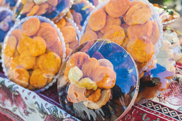View of traditional armenian local candy sweets delights with churchkhela, sweet sausage, sudzhuk, dried fruits, walnuts and others for sale in a local vendor souvenir shop kiosk of Yerevan, Armenia