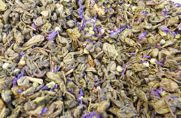 Dry tea with medicinal herbs in bulk in a bag close-up. Phytotherapy and healthy eating  Dried...