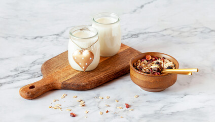 Valentine Day breakfast with yogurt and oat flakes