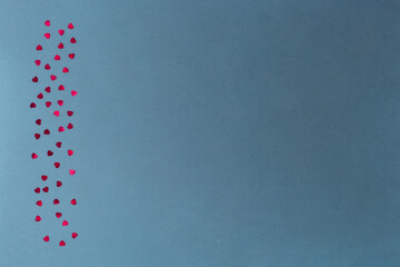 Light grey Valentine day background with red shape form confetti