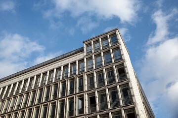 Outdoor sunny view at renovate building with demolish and removed all facade panel of modern building at construction site. 