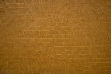 Boring plain yellow brick wall