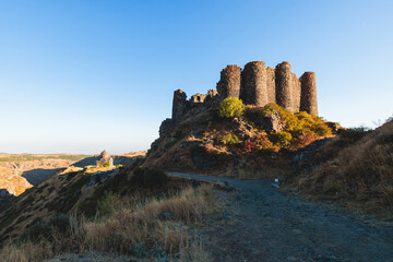 Fototapeta premium Beautiful sunny view of Amberd fortress, Mount Aragats with horse pasturing, Aragatsotn, Armenia in a summer day