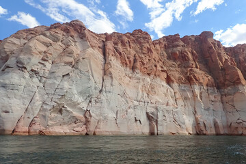 Fototapeta na wymiar Colorful sandstone rock formations along the Colorado River at Glen Canyon National Recreation Area