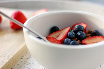 Healthy breakfast with fruit and granola