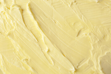 Texture of tasty homemade butter as background, top view