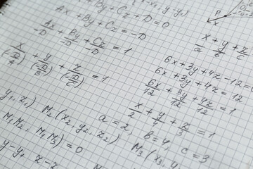 Fototapeta premium Sheet of paper with different mathematical formulas, closeup