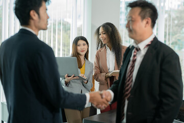 Asia business meeting   consultations of business people in the company's meeting room Discuss, present, present new projects, present 