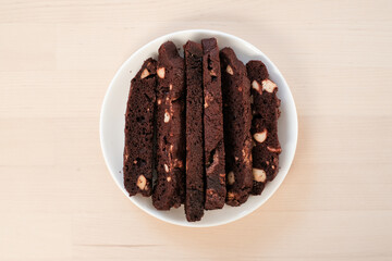 Homemade chocolate biscotti cookies ,Traditional Italian dessert on white plate