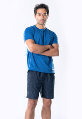 Fototapeta premium Elegant young man in blue shirt standing on white background