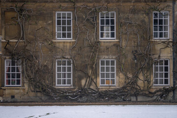 Christ College near St.John’s College , Nice buildings architecture during winter snow at...