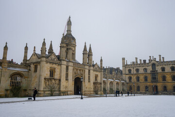 King's College Cambridge , King's College Porters' Lodge gate during winter snow at Cambridge ,...