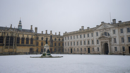 King's College Cambridge , Front Court Gibbs Buildings and Wilkins' Building during winter snow at...