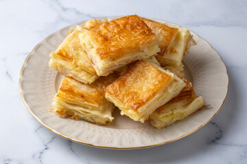 Delicious Turkish Tray pastry, Su boregi with cheese. Adana borek.