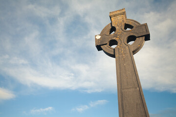 Irish Culture, Travel concept. Stone monument of Christian Cross in Bruff, County Limerick,...