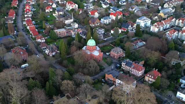 Aerial drone shot of Christuskirche in the small german town Lahr in Schwarzwald. houses and church in german village