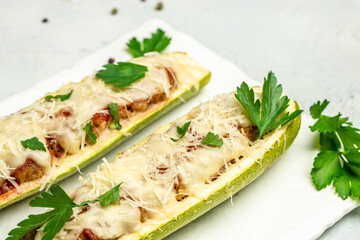 Zucchini stuffed with meat and cheese. Restaurant menu, dieting, cookbook recipe top view