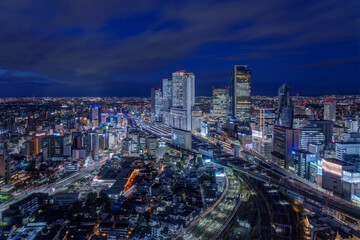 Fototapeta na wymiar Panoramic view of Nagoya station and its vicinity downtown area at night. 