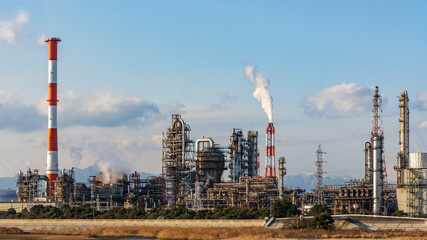 Fototapeta na wymiar The petrochemical complex at Yokkaichi Port at daytime.
