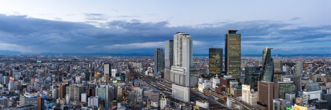 Ultra wide image of Nagoya station and its central area at in the evening with cloud.