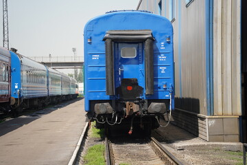 Fototapeta na wymiar Almaty, Kazakhstan - 05.20.2022 - Passenger train cars at the technical inspection point at the station.