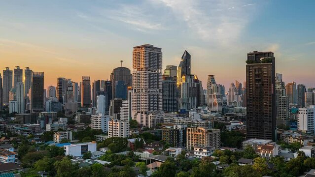Day to night timelapse of big city downtown, skyscrapers, sunset, Asia