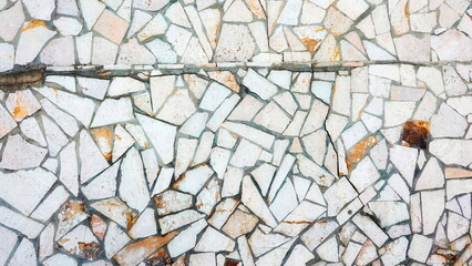 Marble Mosaic Floor. Texture made of different pieces of broken Tiles. High quality photo