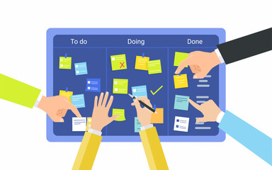 Team planning weekly schedule tasks on task board. Team and schedule planning with filling doing and done work done.