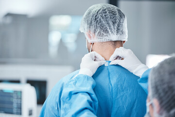 Surgeon, scrubs and uniform to prepare for surgery, operation and and healthcare in medical...