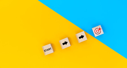 Starting point and a wooden cube with an arrow pointing to the target icon. Growing business...