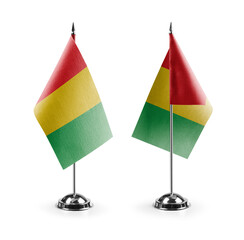 Small national flags of the Guinea on a white background
